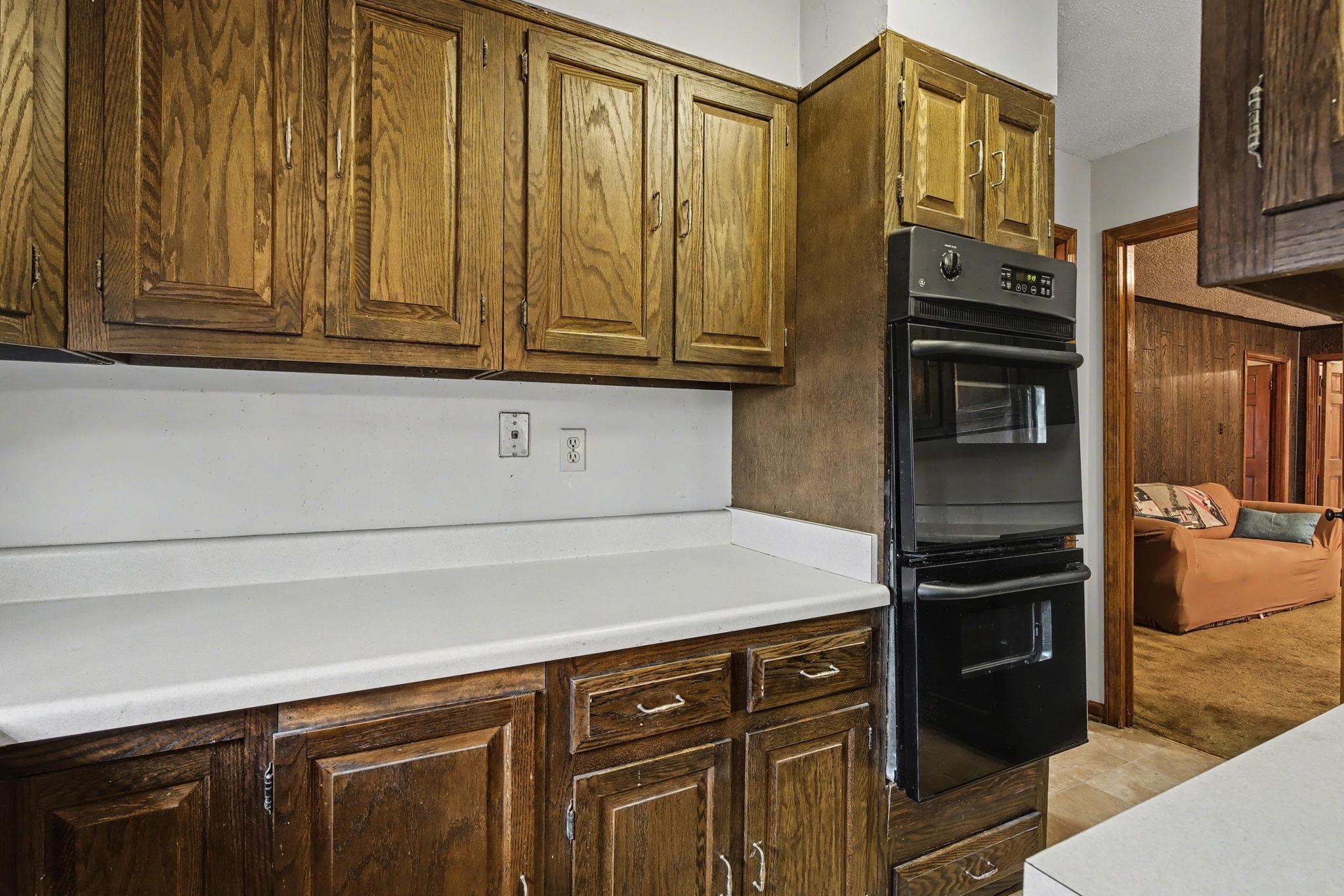 7439 Lexie Gardner Road Bartlett, TN 38002 - Photo 10 of 40 a kitchen with stainless steel appliances granite countertop a refrigerator and cabinets
