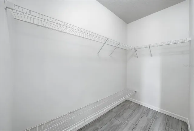 a view of a room with racks on the wall