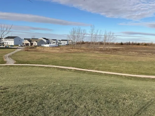 a view of a lake with outdoor space