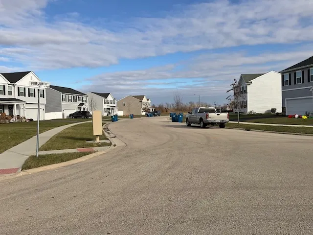 a view of a street with cars
