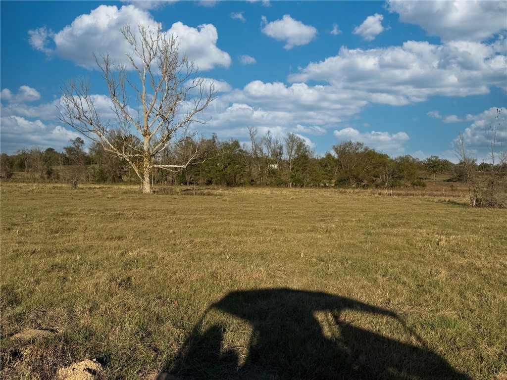 11281 Gourd Neck Loop, Unit COUNTYROAD Franklin, TX 77856 - Photo 35 of 46 a view of an ocean from a balcony