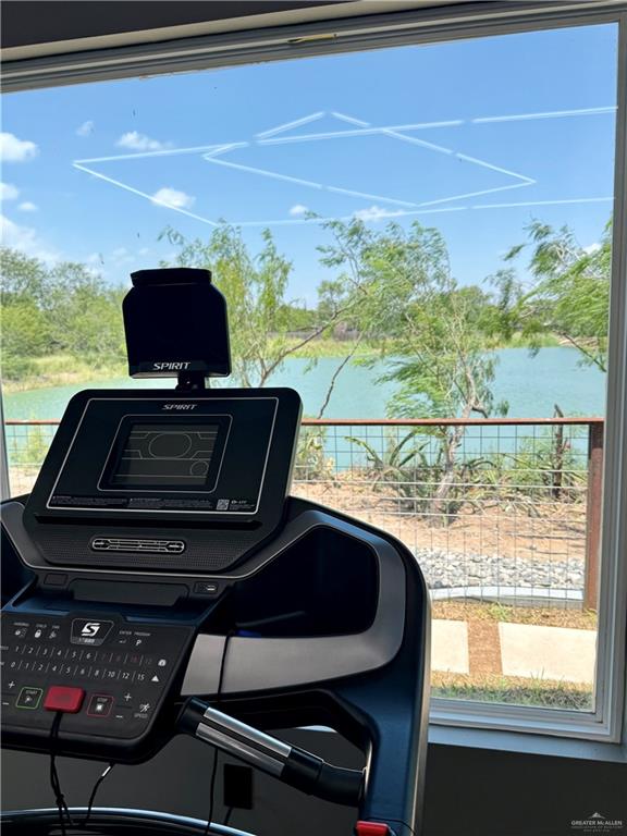 4005 Jenna Lane, Unit A Weslaco, TX 78599 - Photo 25 of 28 a view of a balcony with chair and wooden floor