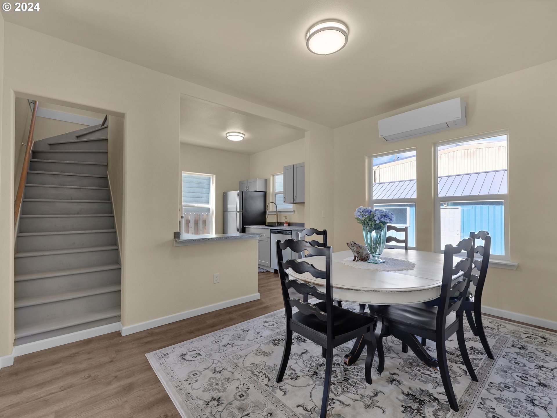 118 Main Street Southwest Ilwaco, WA 98624 - Photo 11 of 44 a view of a dining room with furniture and window