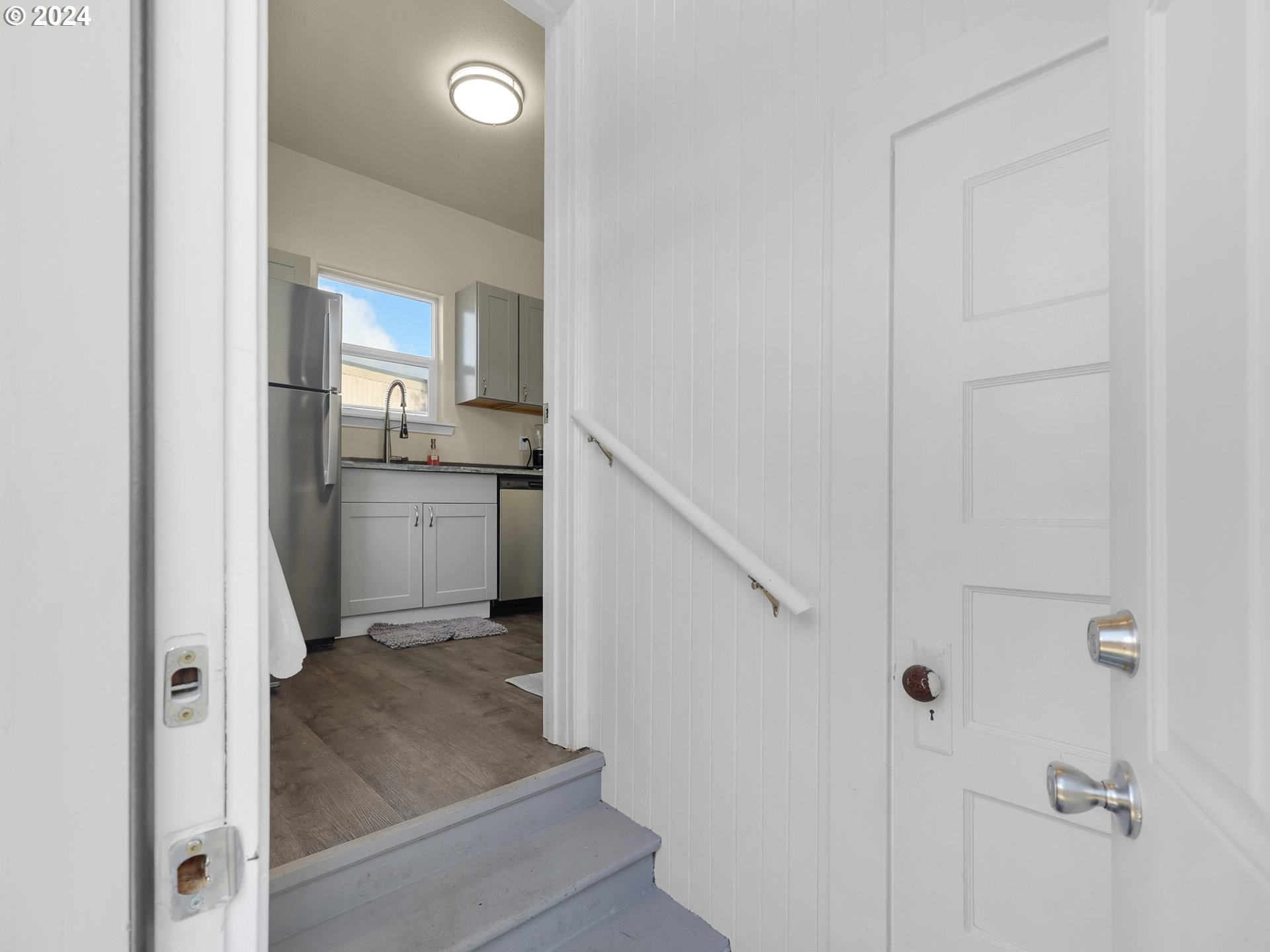 118 Main Street Southwest Ilwaco, WA 98624 - Photo 19 of 44 a view of a kitchen from the hallway