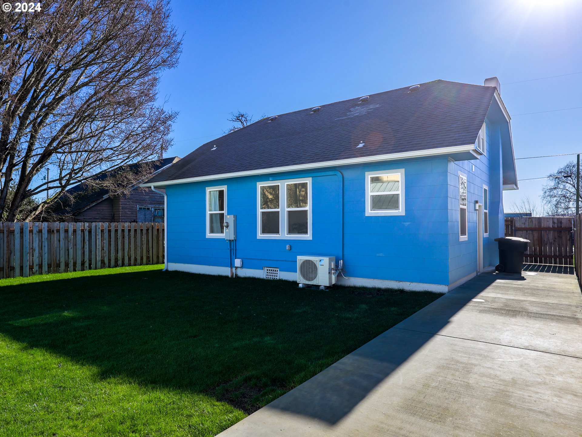 118 Main Street Southwest Ilwaco, WA 98624 - Photo 2 of 44 a view of a house with a yard