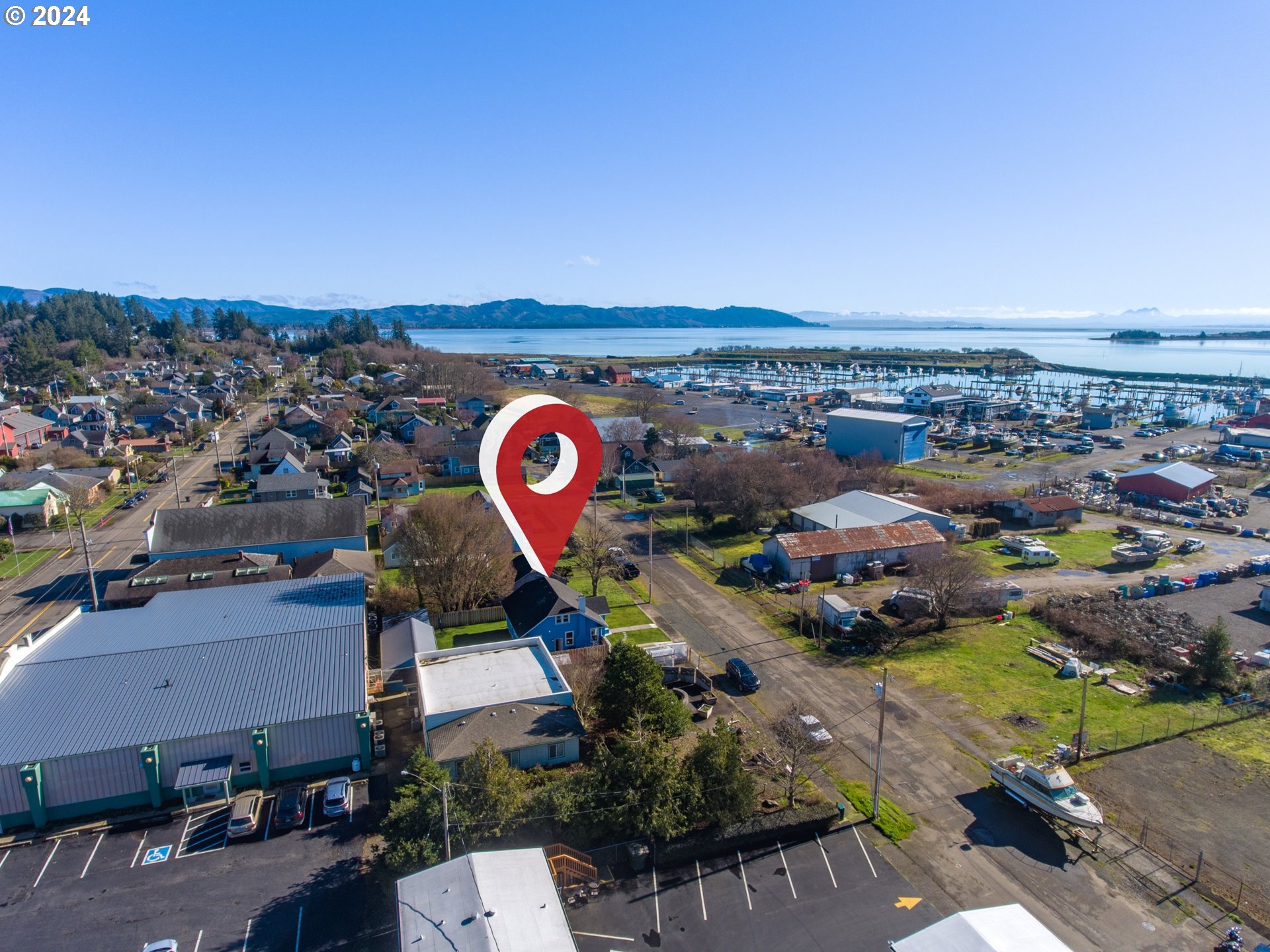 118 Main Street Southwest Ilwaco, WA 98624 - Photo 3 of 44 an aerial view of a city