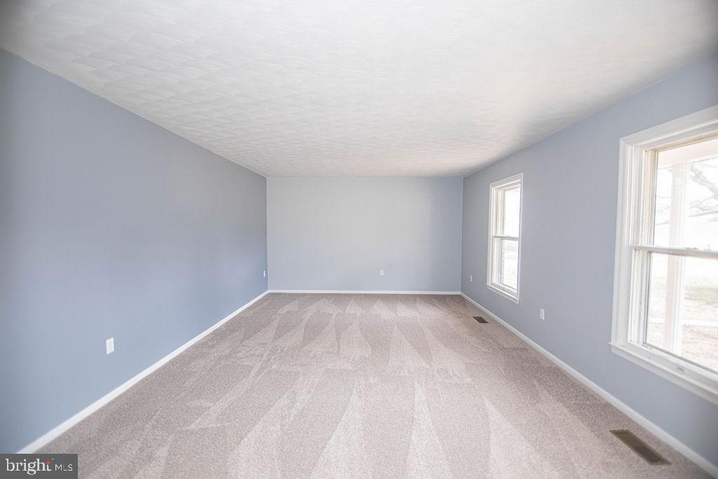 245 Windy Hill Road Shermans Dale, PA 17090 - Photo 14 of 42 an empty room with windows