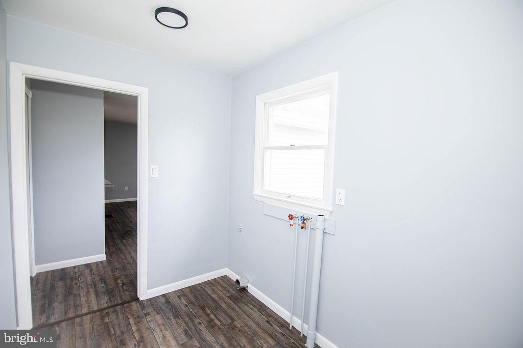245 Windy Hill Road Shermans Dale, PA 17090 - Photo 28 of 42 a view of a room with wooden floor and a bathroom