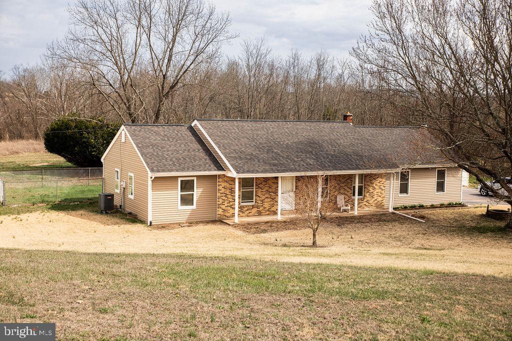 245 Windy Hill Road Shermans Dale, PA 17090 - Photo 6 of 42 a view of a house with a patio
