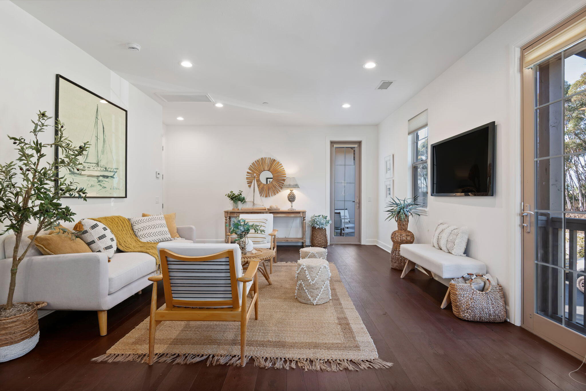7863 Whimbrel Lane Goleta, CA 93117 - Photo 1 of 22 a living room with furniture and a flat screen tv