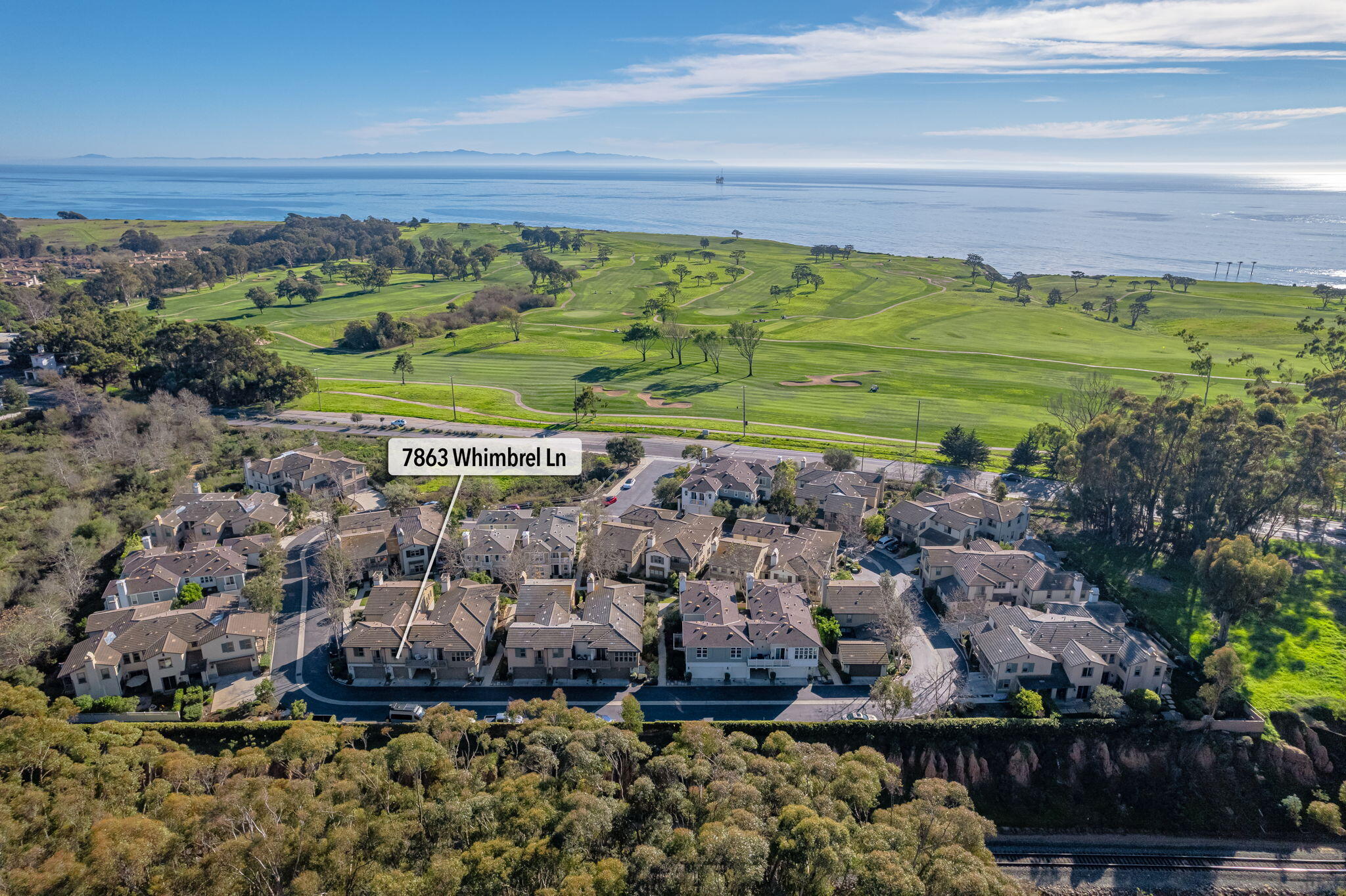 7863 Whimbrel Lane Goleta, CA 93117 - Photo 3 of 22 a view of a street with a building in the background