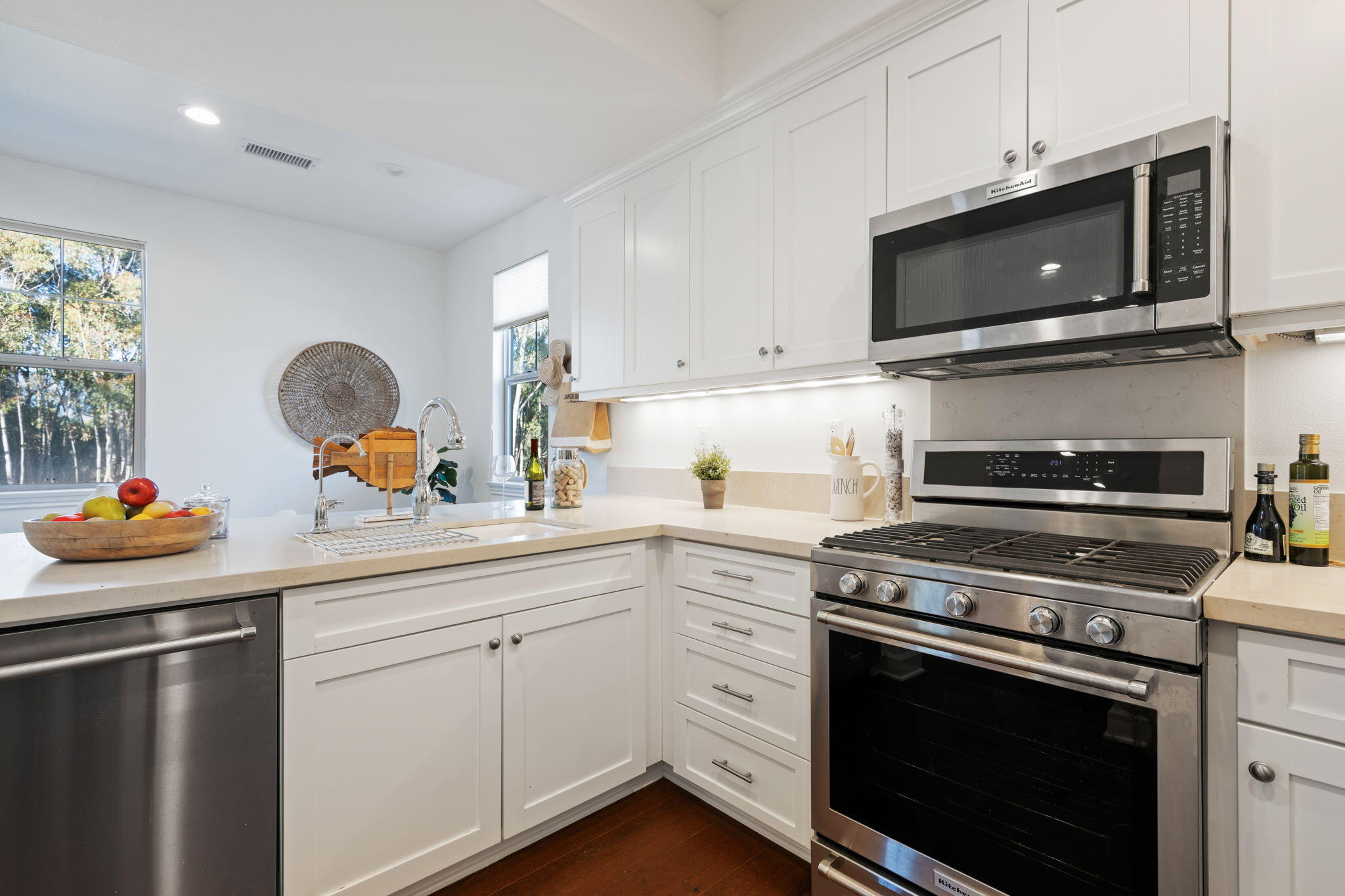7863 Whimbrel Lane Goleta, CA 93117 - Photo 6 of 22 a kitchen with a sink stove and microwave