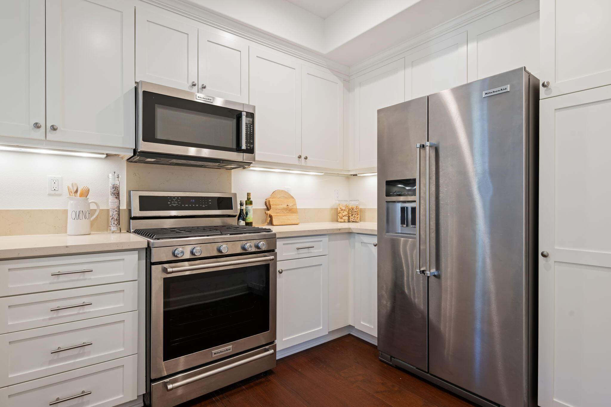 7863 Whimbrel Lane Goleta, CA 93117 - Photo 7 of 22 a kitchen with a stove microwave and refrigerator
