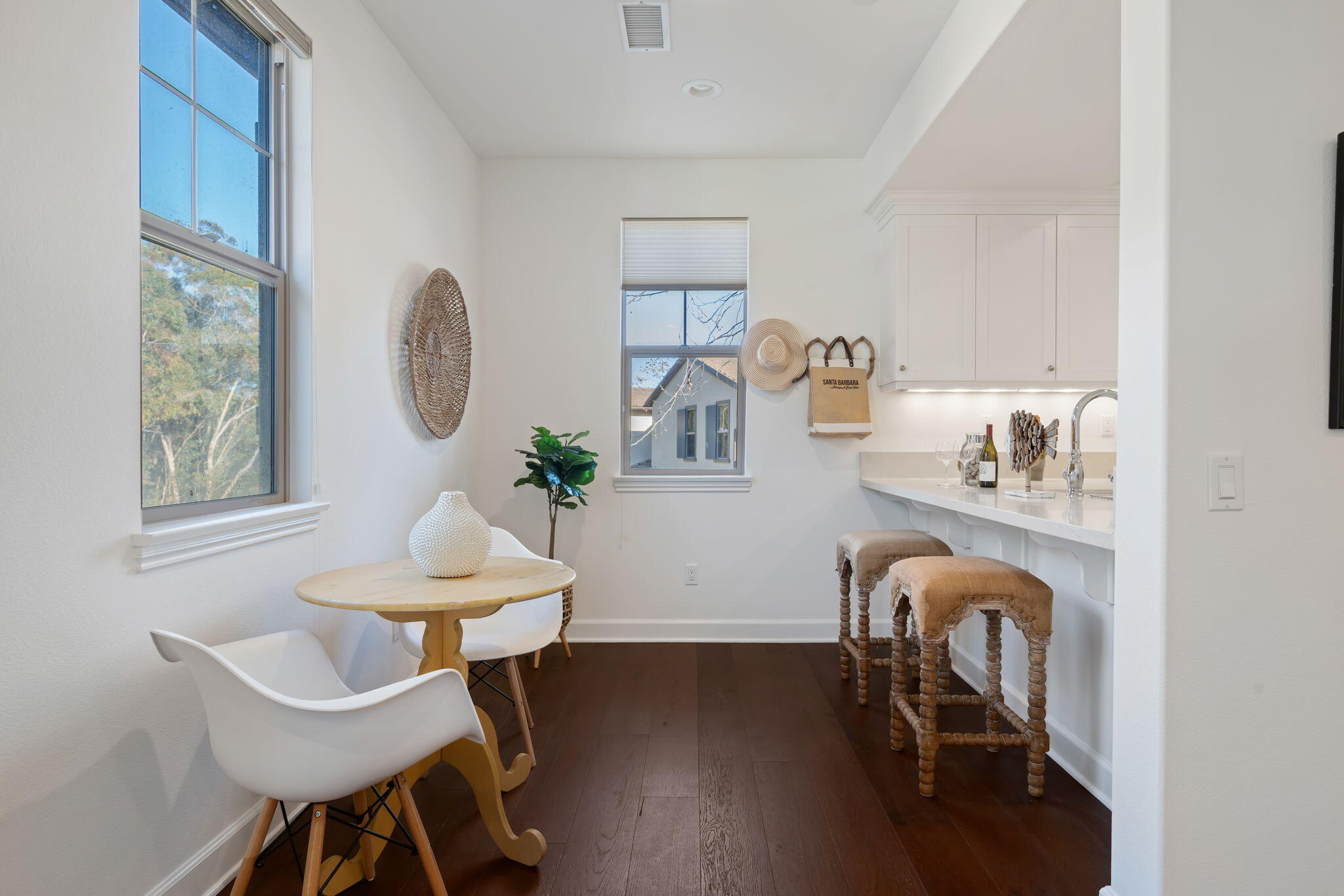 7863 Whimbrel Lane Goleta, CA 93117 - Photo 10 of 22 a view of a dining room with furniture window and wooden floor