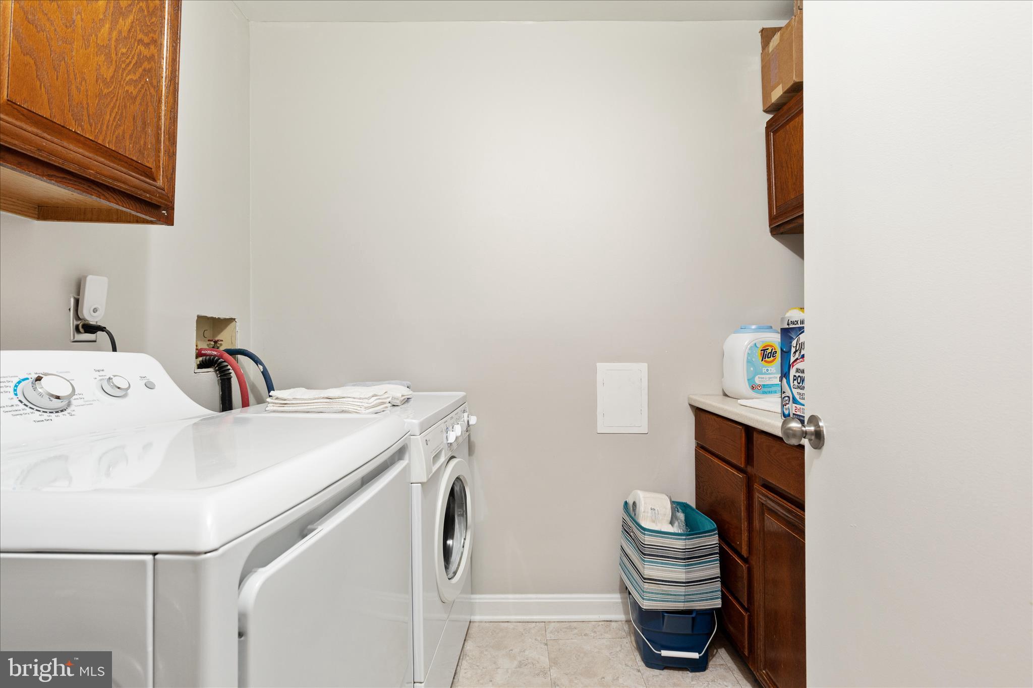 10198 Oakton Terrace Road Oakton, VA 22124 - Photo 14 of 22 a utility room with a sink dryer and washer