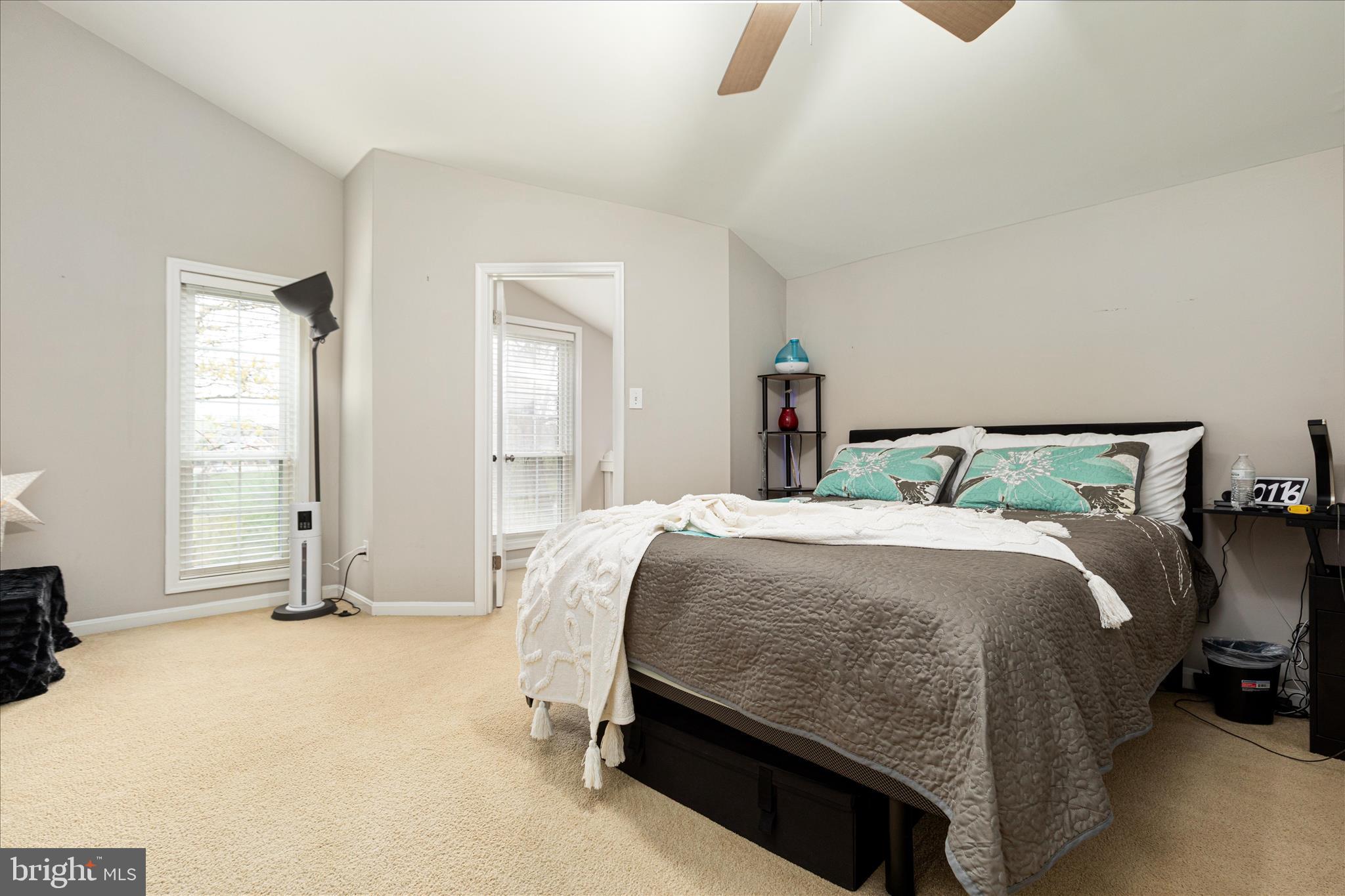 10198 Oakton Terrace Road Oakton, VA 22124 - Photo 16 of 22 a bed room with a bed and a chair