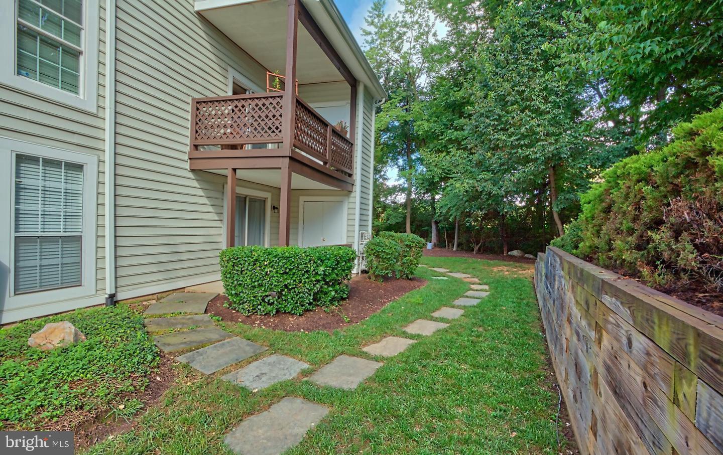 10198 Oakton Terrace Road Oakton, VA 22124 - Photo 20 of 22 a front view of a house with garden