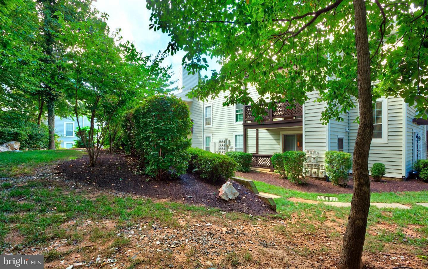 10198 Oakton Terrace Road Oakton, VA 22124 - Photo 21 of 22 a front view of a house with garden