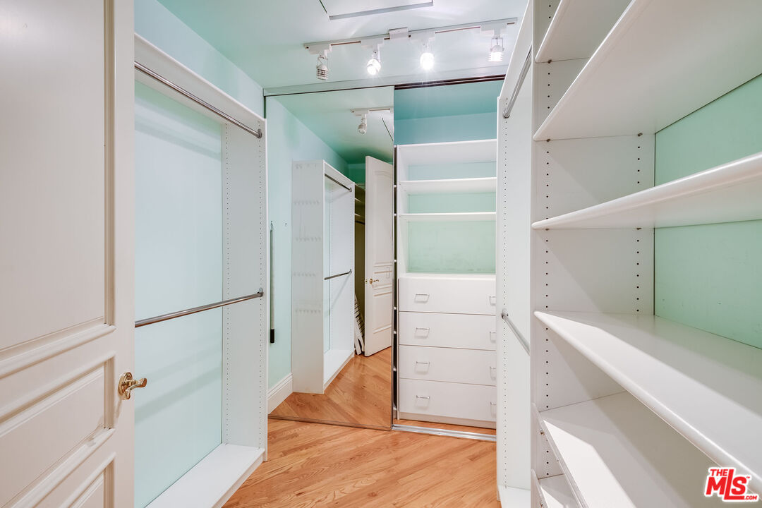 10045 Valley Spring Lane Toluca Lake, CA 91602 - Photo 17 of 36 a view of walk in closet