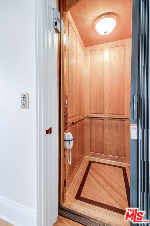 10045 Valley Spring Lane Toluca Lake, CA 91602 - Photo 22 of 36 an entryway with wooden floor