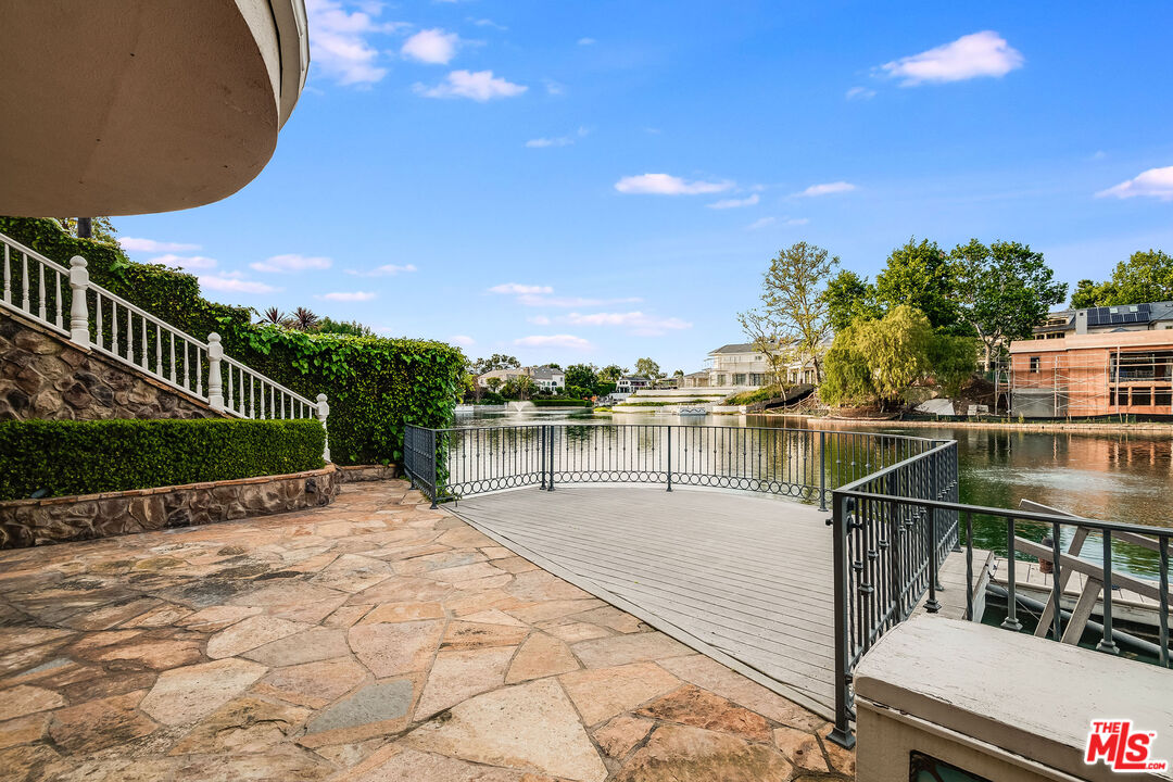 10045 Valley Spring Lane Toluca Lake, CA 91602 - Photo 25 of 36 a view of a balcony with lake view