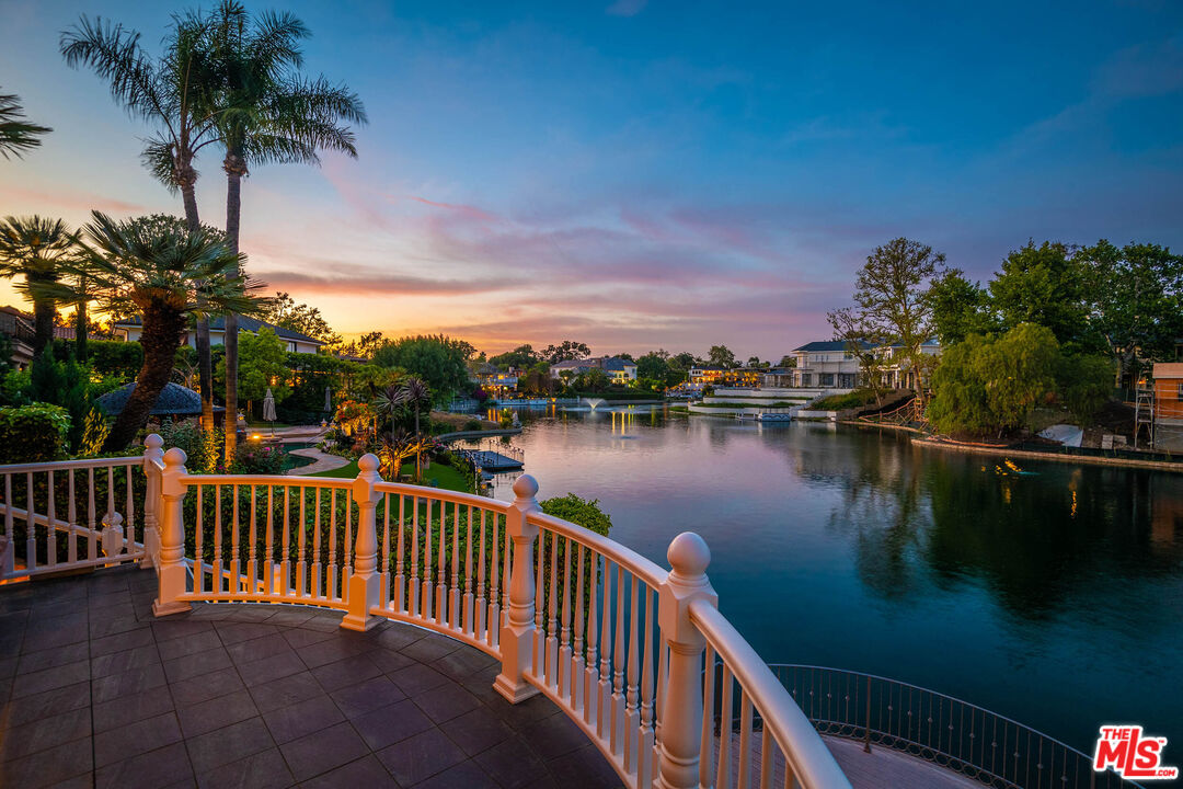 10045 Valley Spring Lane Toluca Lake, CA 91602 - Photo 3 of 36 a view of a lake with a terrace