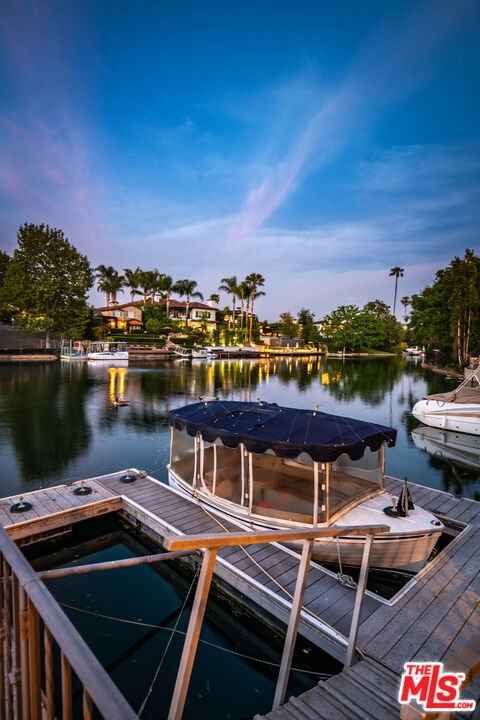 10045 Valley Spring Lane Toluca Lake, CA 91602 - Photo 8 of 36 a view of a balcony with chairs