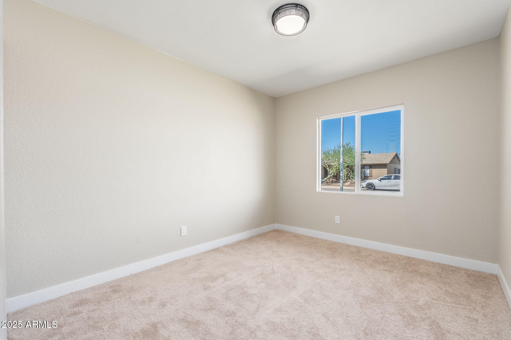 1805 West Cheyenne Drive Chandler, AZ 85224 - Photo 19 of 32 an empty room with windows