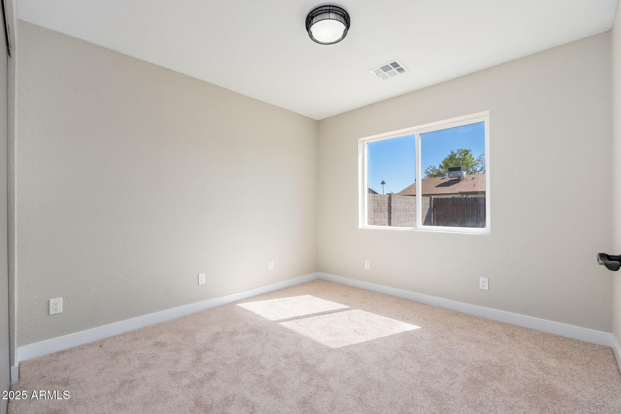 1805 West Cheyenne Drive Chandler, AZ 85224 - Photo 21 of 32 a room with a window