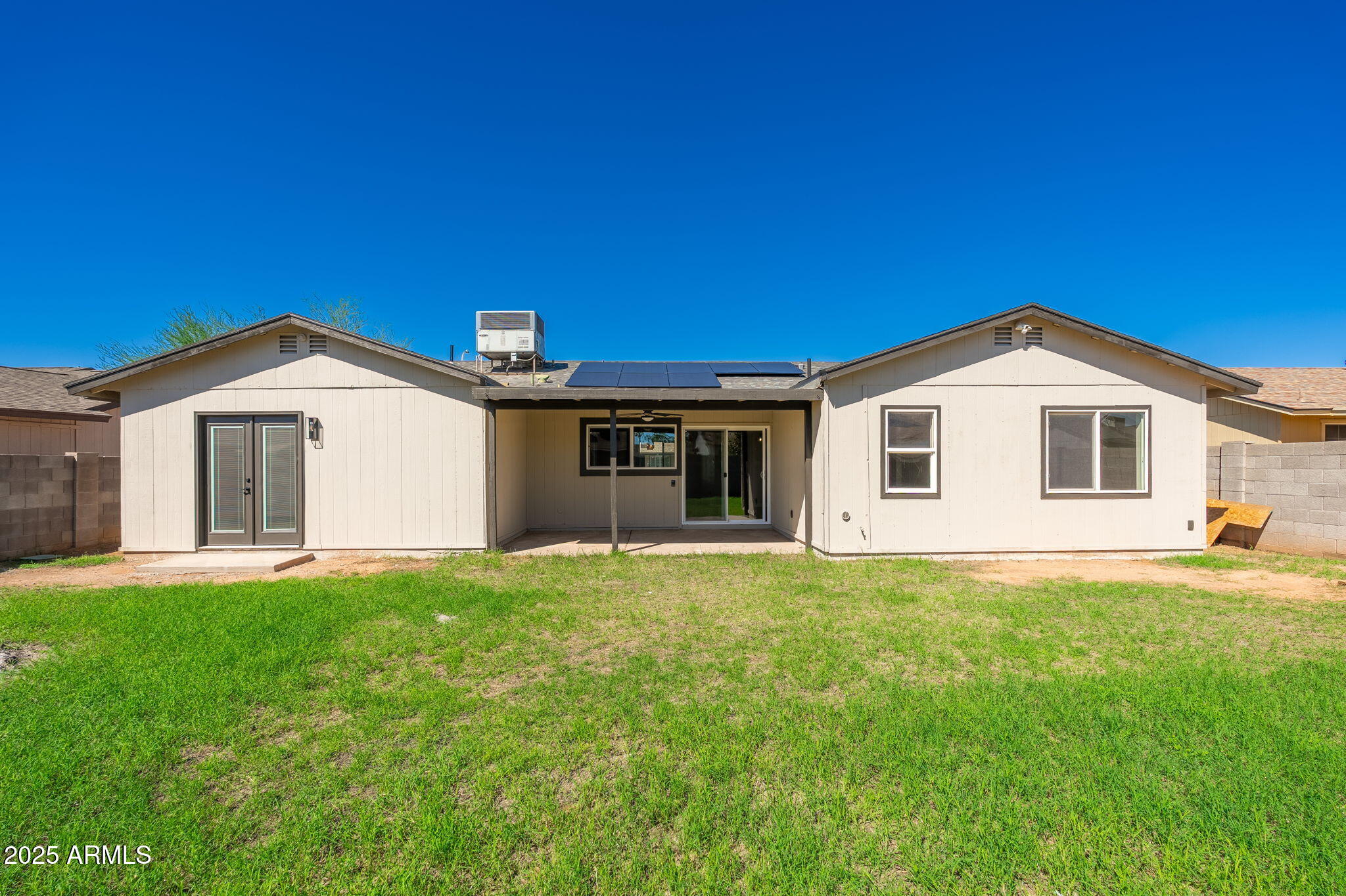 1805 West Cheyenne Drive Chandler, AZ 85224 - Photo 30 of 32 a view of a house with a yard