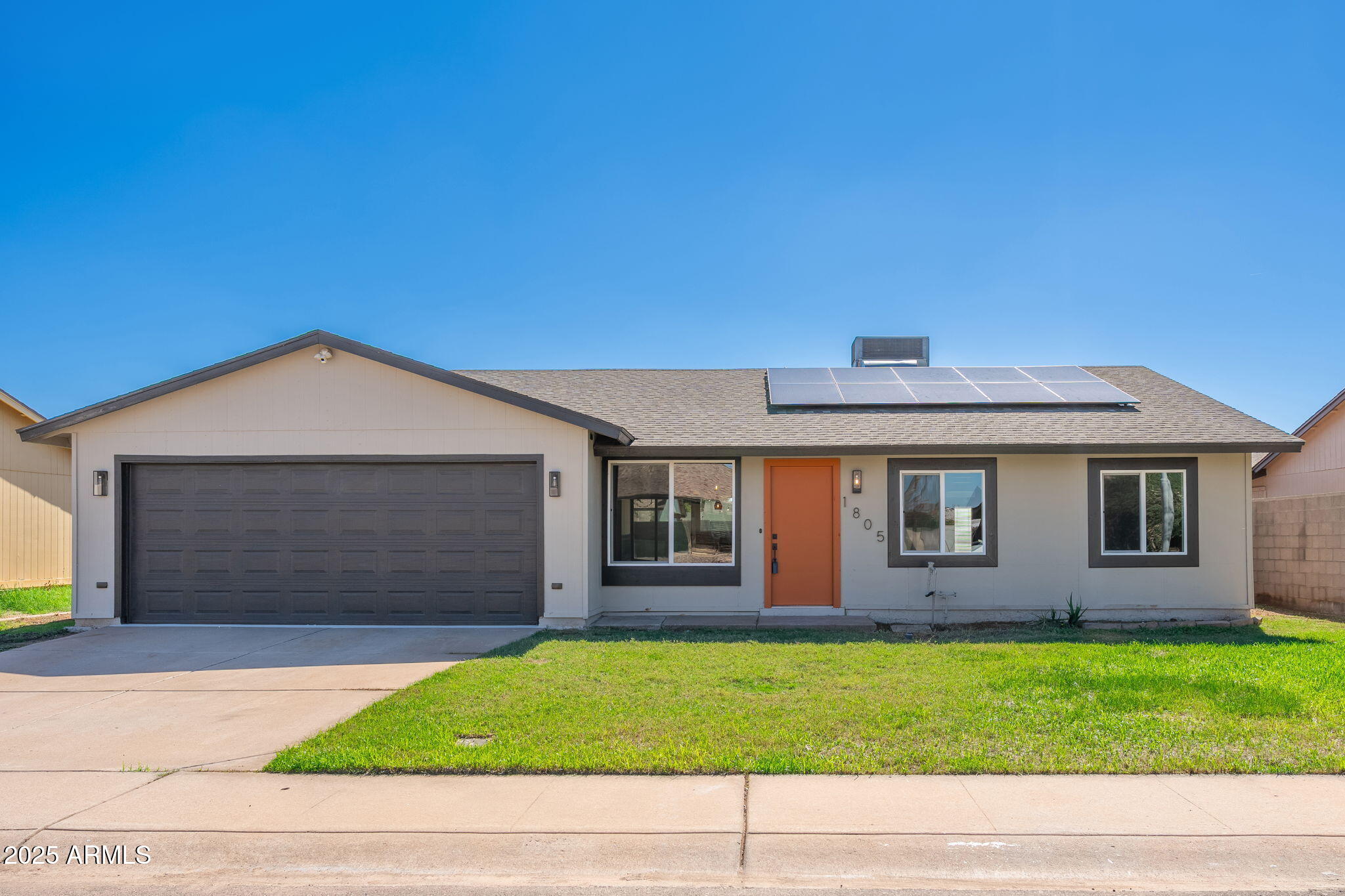 1805 West Cheyenne Drive Chandler, AZ 85224 - Photo 31 of 32 a brick house with a outdoor space