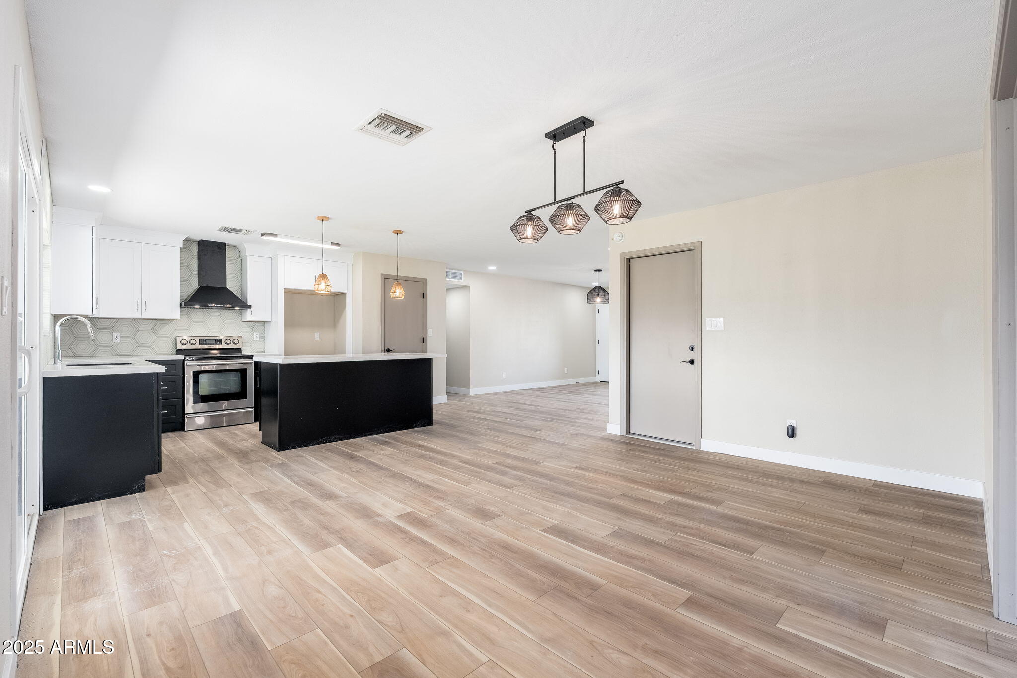 1805 West Cheyenne Drive Chandler, AZ 85224 - Photo 7 of 32 a view of kitchen with wooden floor