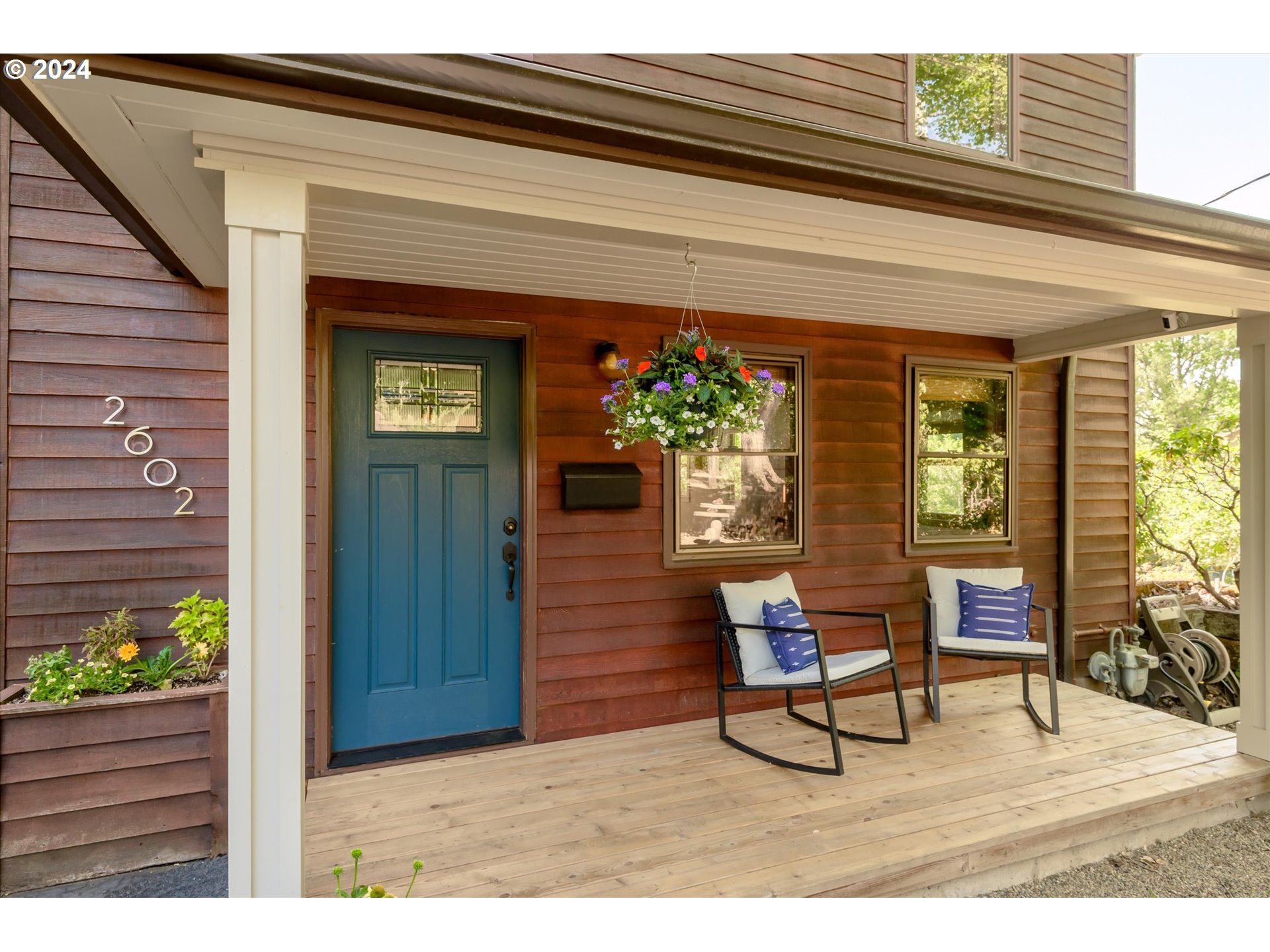 2602 Agate Street Eugene, OR 97403 - Photo 2 of 37 a living room filled with furniture and a potted plant