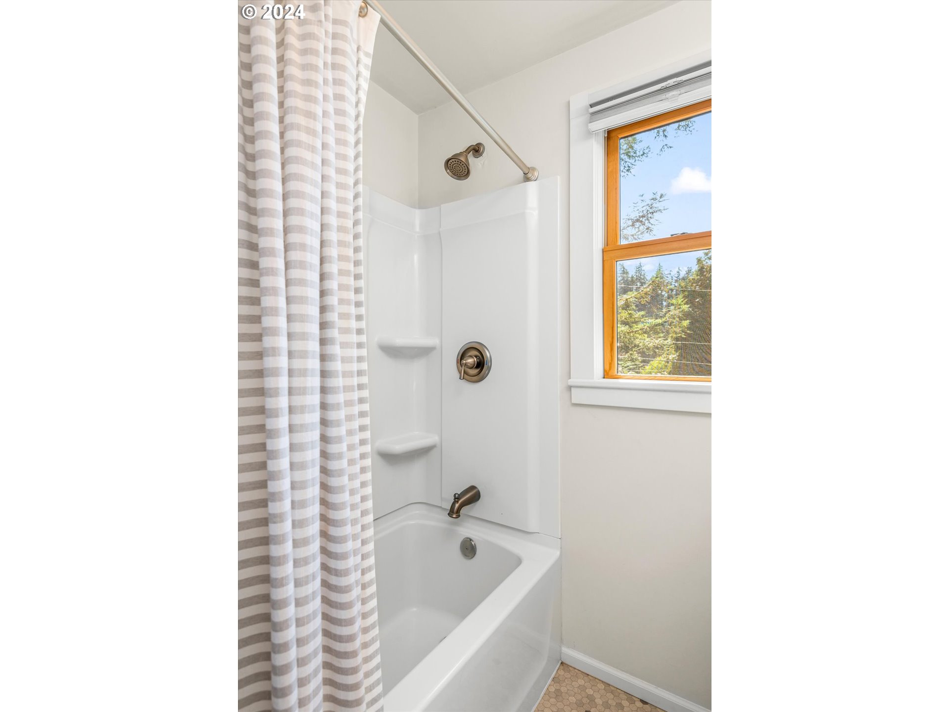 2602 Agate Street Eugene, OR 97403 - Photo 31 of 37 a bathroom with a bathtub and shower