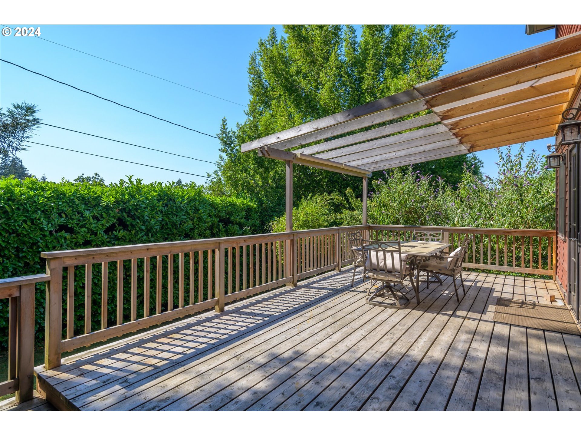 2602 Agate Street Eugene, OR 97403 - Photo 35 of 37 a view of a wooden deck with furniture