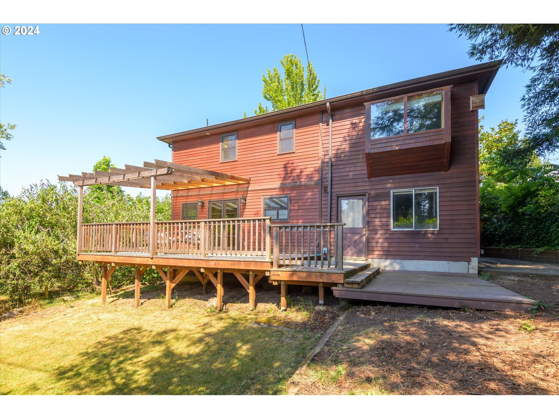 2602 Agate Street Eugene, OR 97403 - Photo 36 of 37 a view of a house with pool and chairs