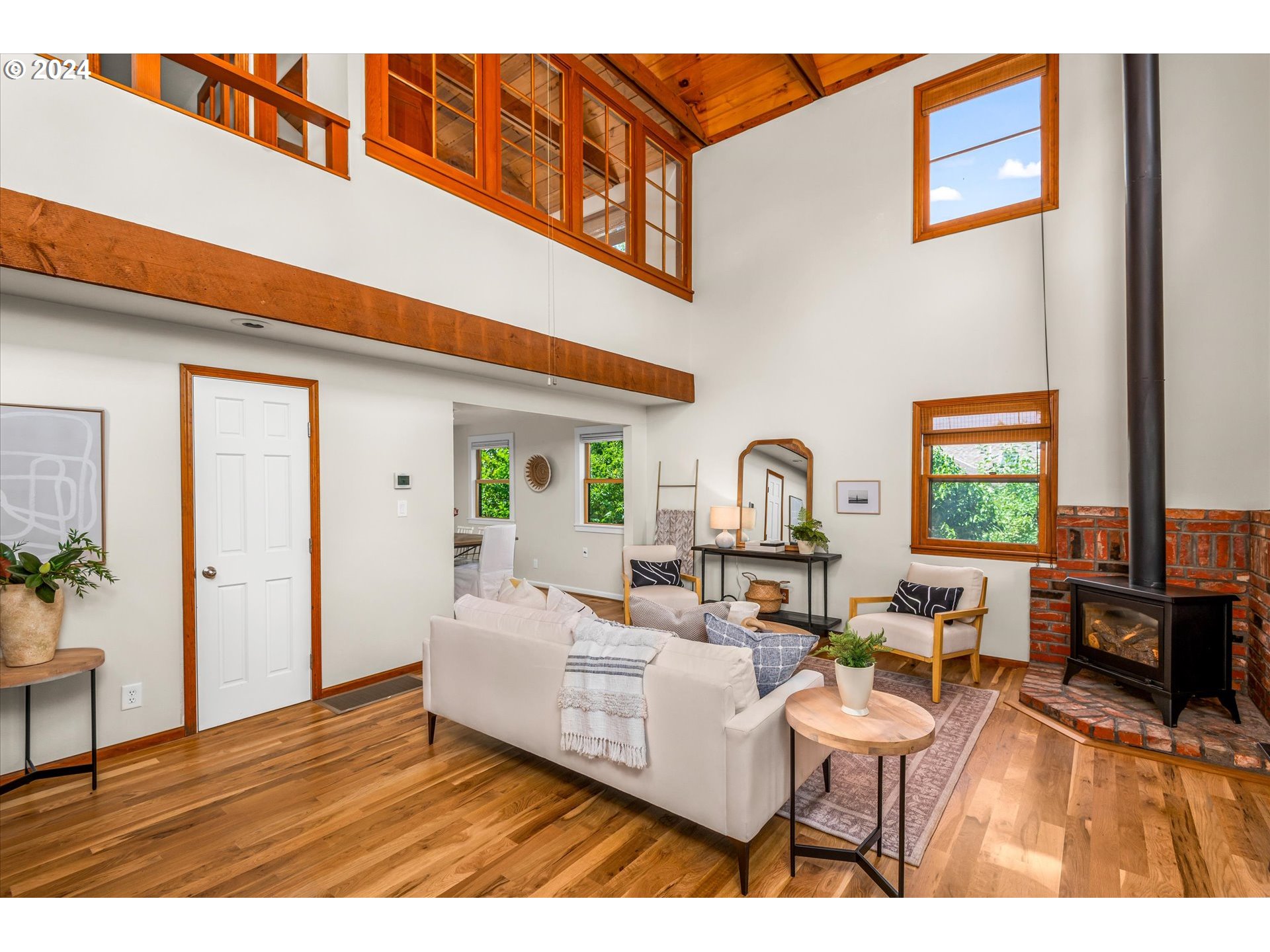 2602 Agate Street Eugene, OR 97403 - Photo 5 of 37 a living room with furniture and a wooden floor