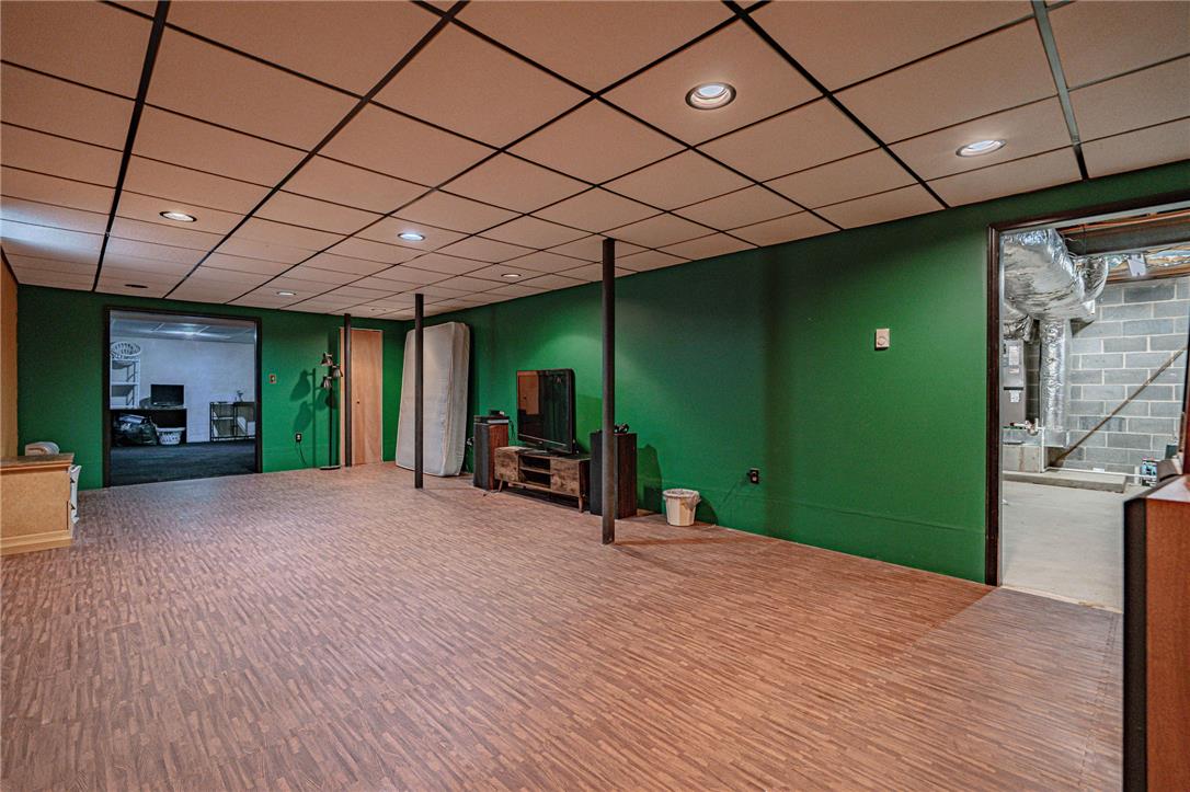 652 Old State Road Oley, PA 19547 - Photo 36 of 54 A versatile finished basement with durable flooring and recessed lighting offers ample space for recreation.