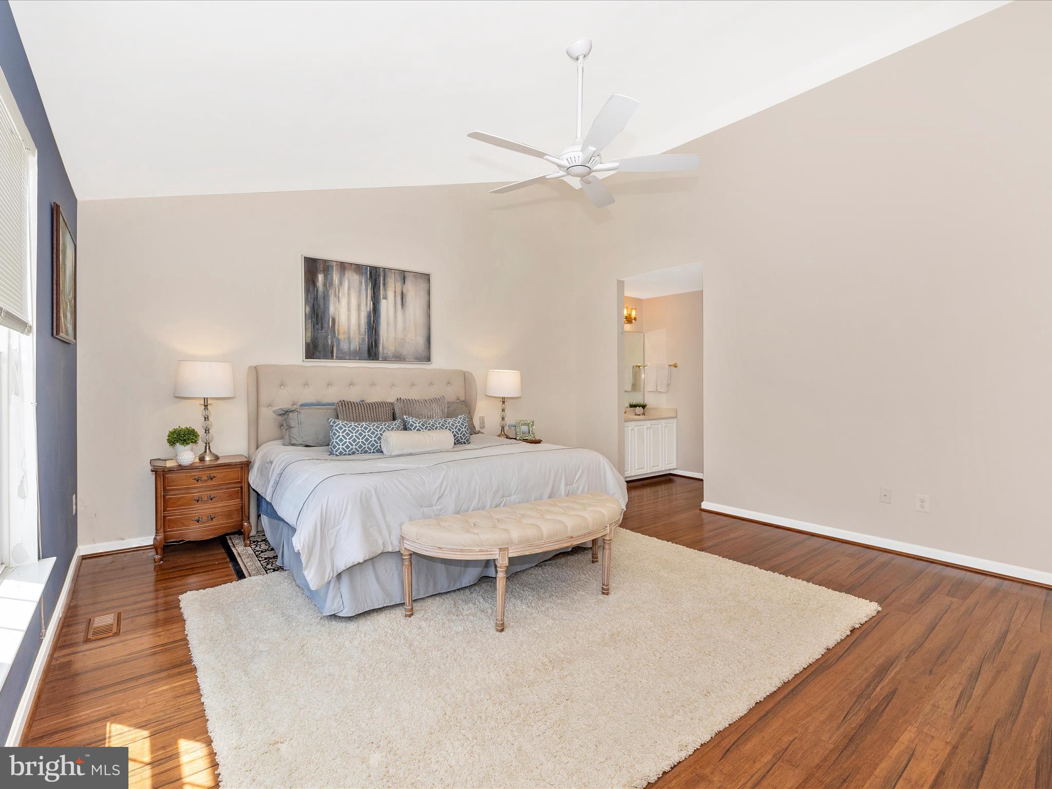 21405 Emerald Drive Germantown, MD 20876 - Photo 13 of 51 a bedroom with a bed and a night stand