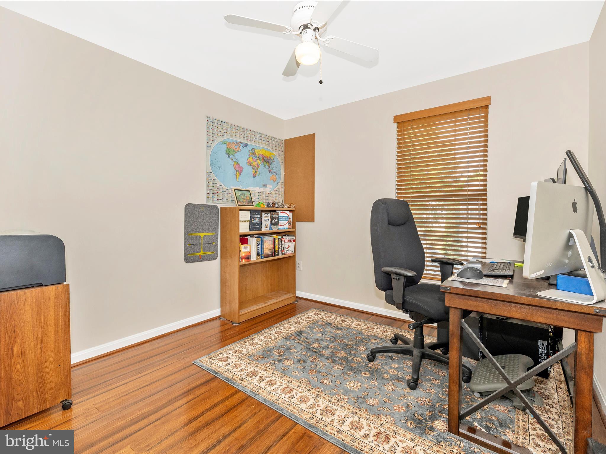 21405 Emerald Drive Germantown, MD 20876 - Photo 18 of 51 a view of a workspace with furniture and a window