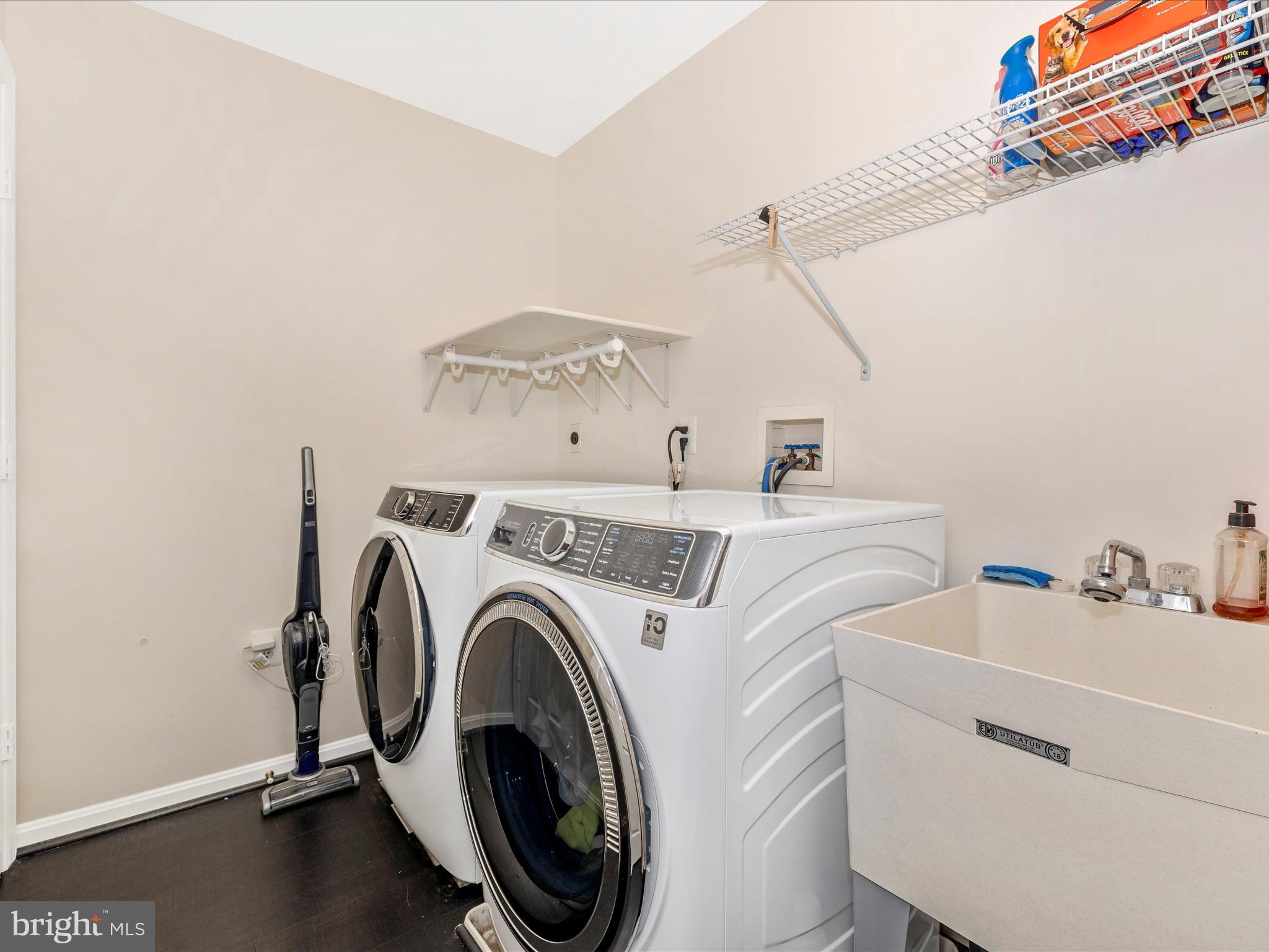 21405 Emerald Drive Germantown, MD 20876 - Photo 25 of 51 a utility room with dryer and washer