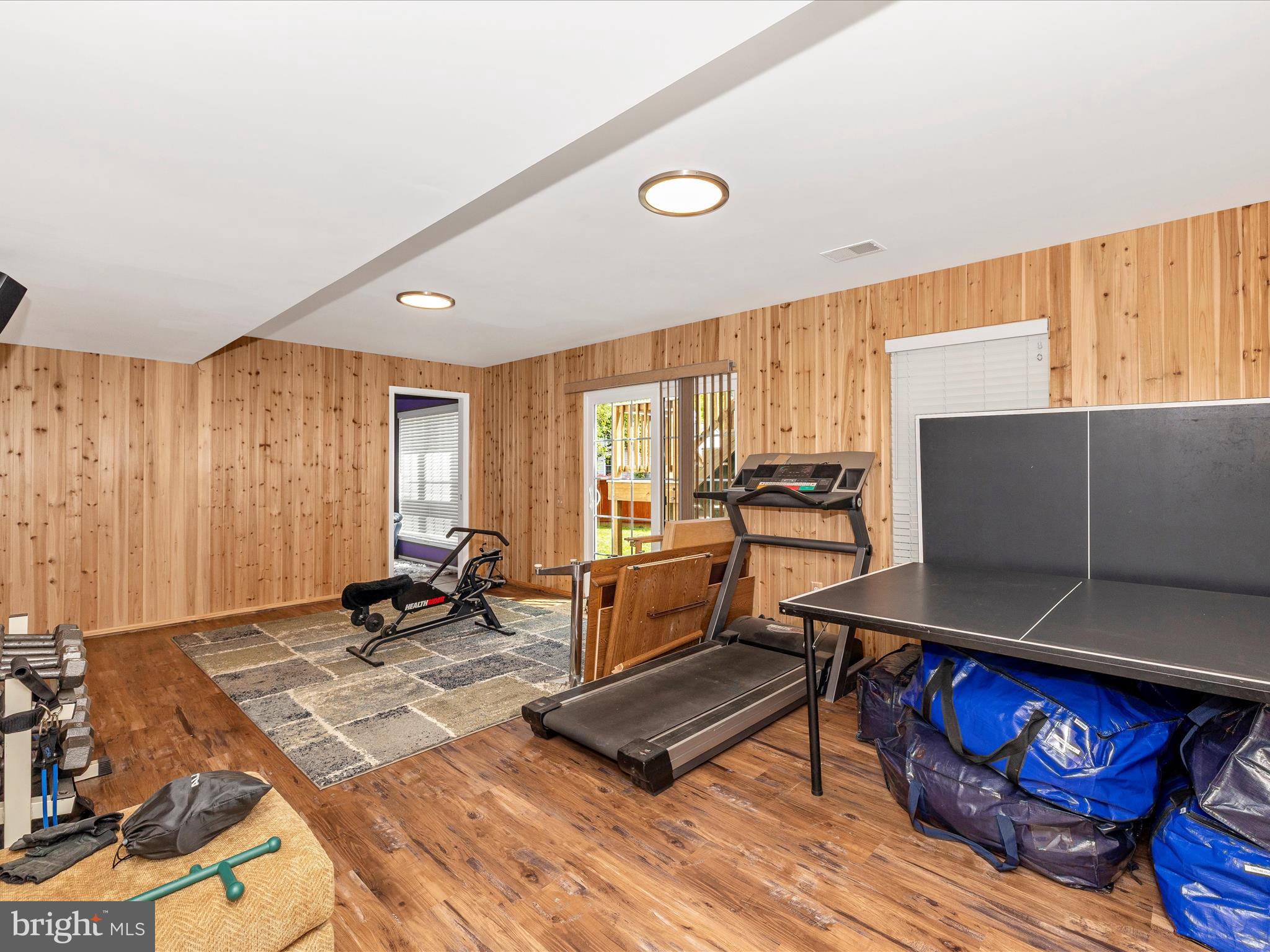 21405 Emerald Drive Germantown, MD 20876 - Photo 26 of 51 a living room with furniture a rug and a window