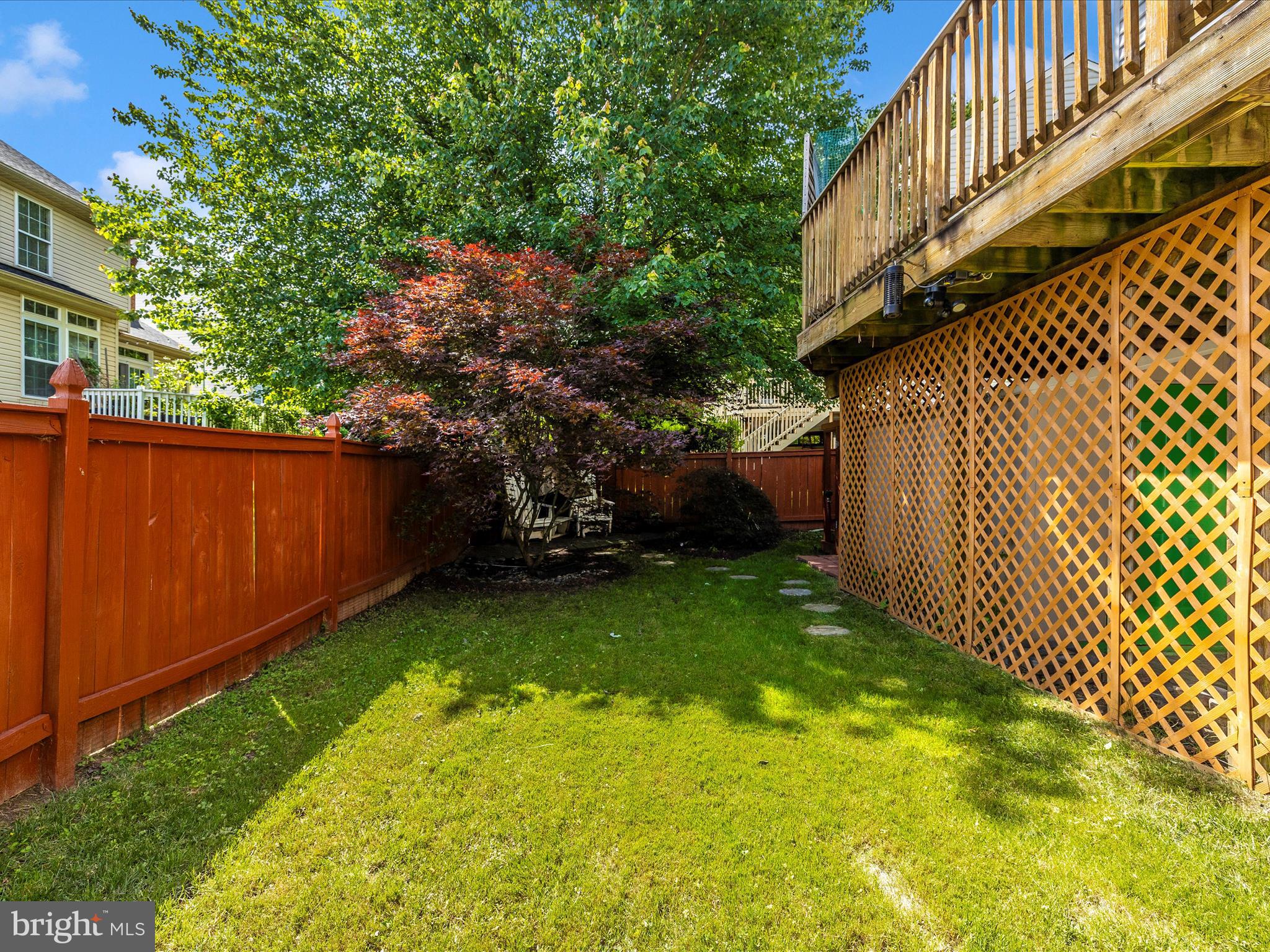 21405 Emerald Drive Germantown, MD 20876 - Photo 37 of 51 a backyard of a house with lots of green space