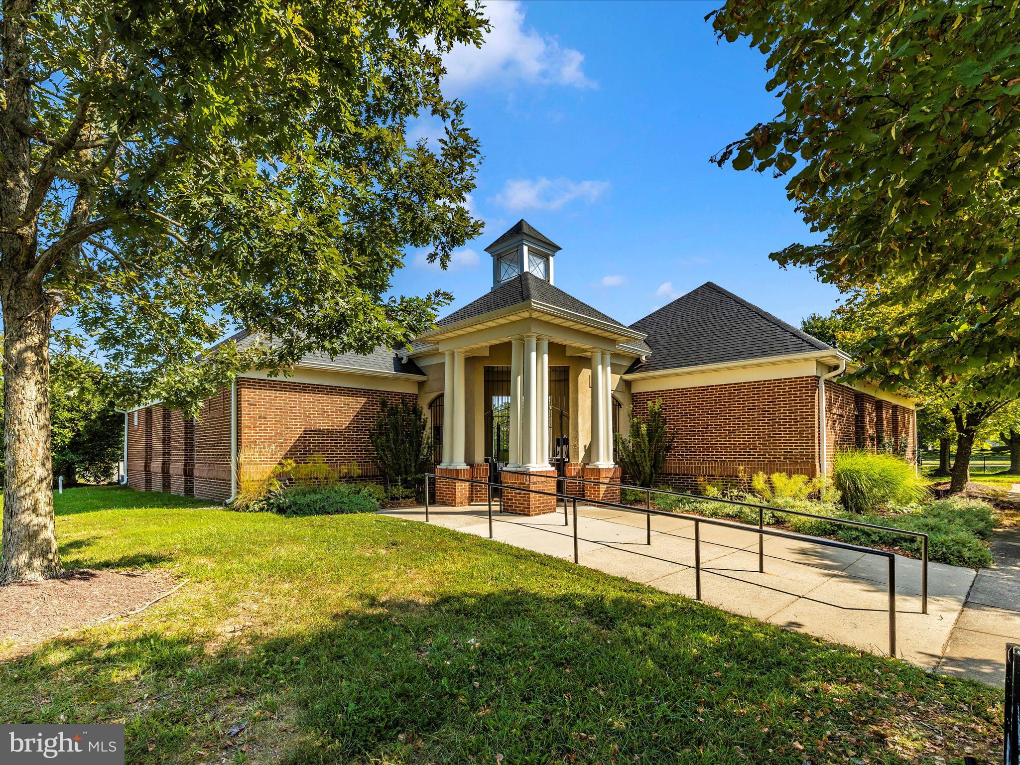 21405 Emerald Drive Germantown, MD 20876 - Photo 45 of 51 a view of a house with a yard