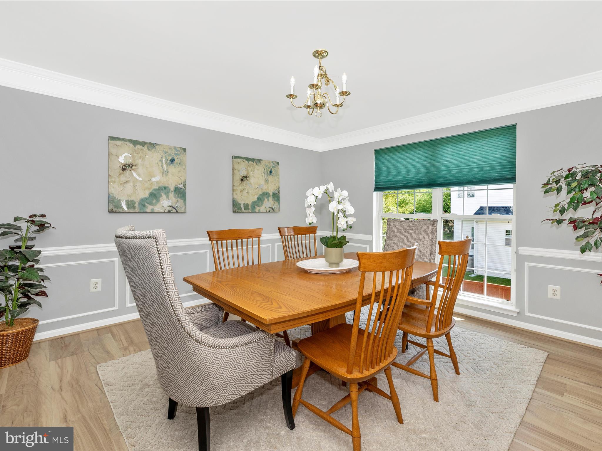21405 Emerald Drive Germantown, MD 20876 - Photo 5 of 51 a view of a dining room with furniture window and wooden floor
