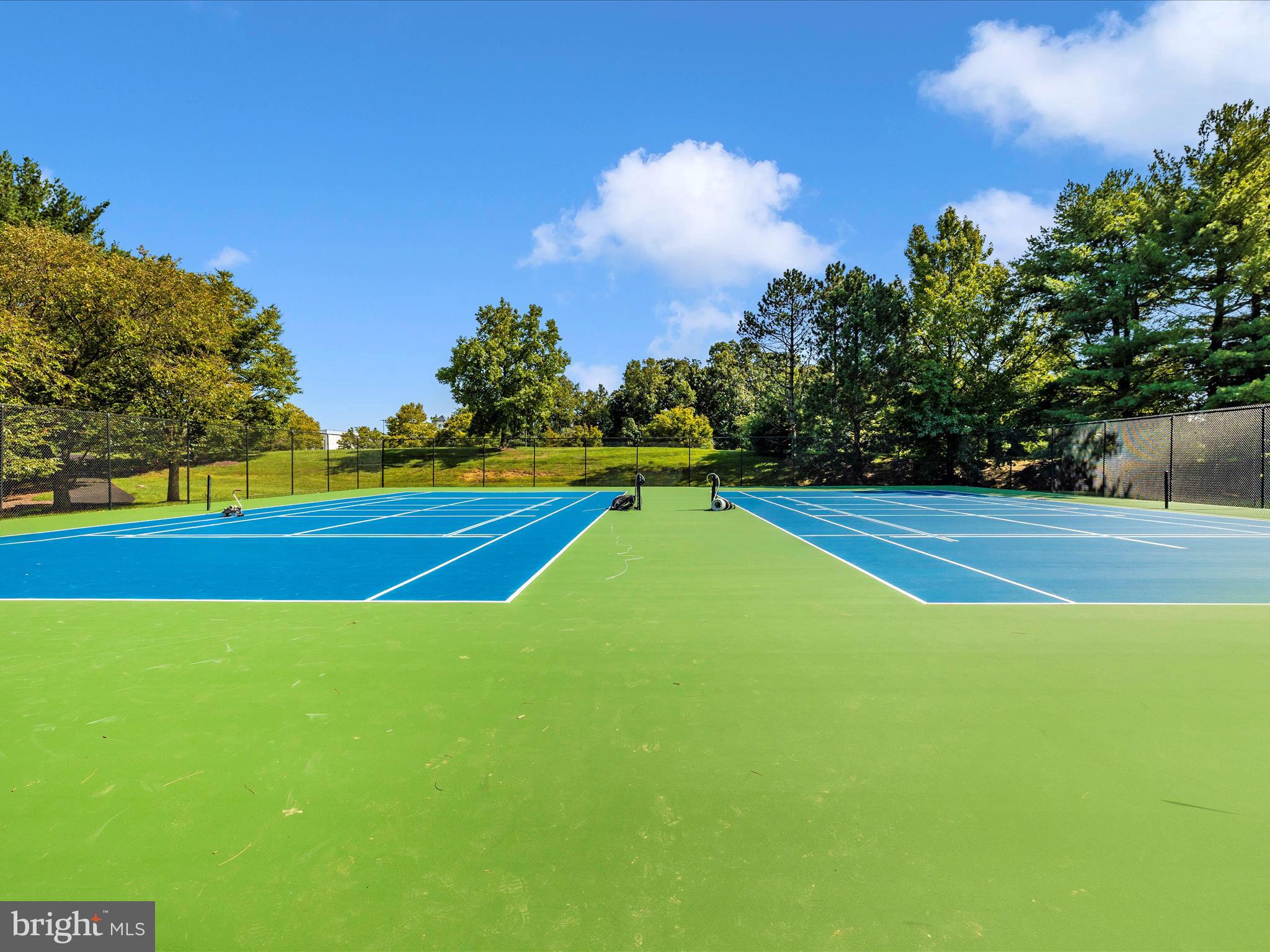 21405 Emerald Drive Germantown, MD 20876 - Photo 51 of 51 a view of an outdoor space and tennis court