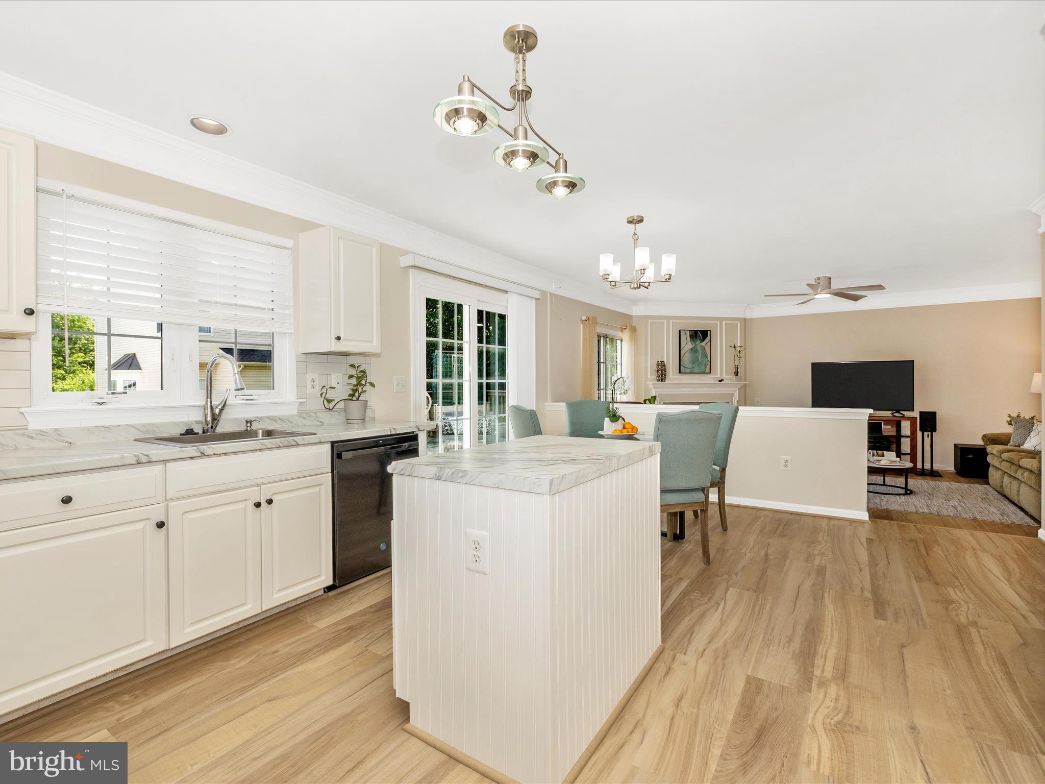 21405 Emerald Drive Germantown, MD 20876 - Photo 6 of 51 a large white kitchen with a large window