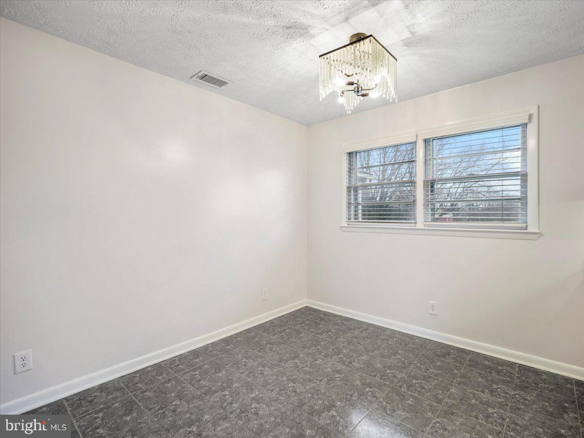 570 Welltown Road Winchester, VA 22603 - Photo 11 of 29 an empty room with a window