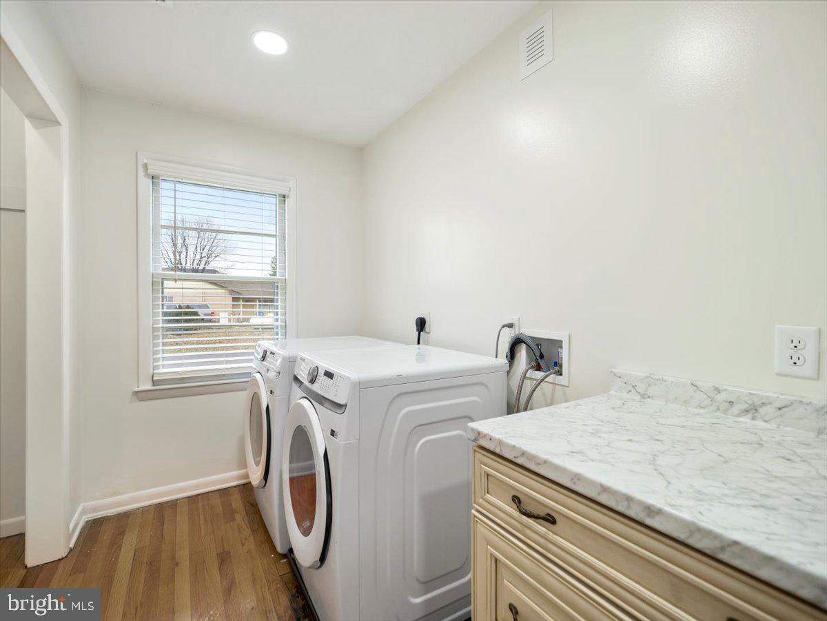 570 Welltown Road Winchester, VA 22603 - Photo 19 of 29 a utility room with dryer and washer