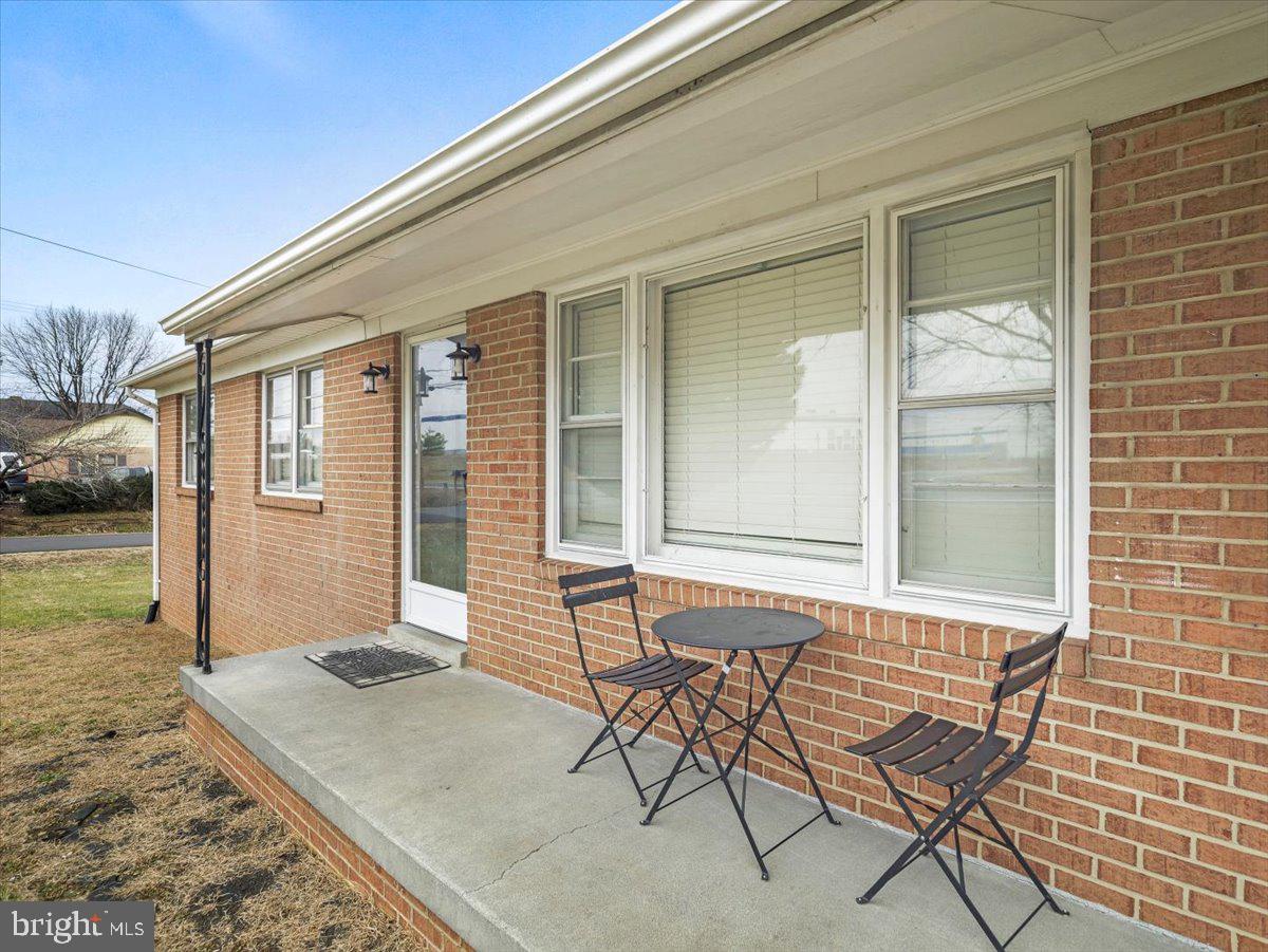 570 Welltown Road Winchester, VA 22603 - Photo 28 of 29 a view of a house with backyard and sitting area